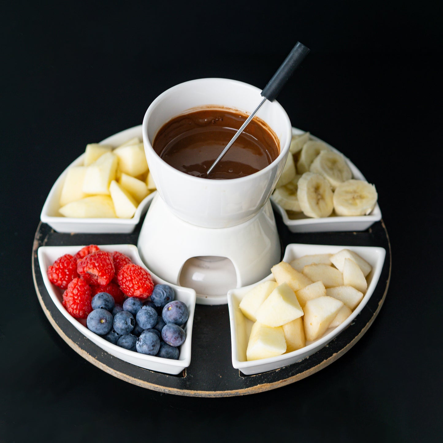 Schokoladenfondue mit verschiedene Früchten