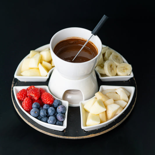 Schokoladenfondue mit verschiedene Früchten